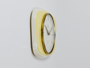 Junghans Wanduhr im Stil von Max Bill, Pastellgelb, Mid-Century, Deutschland, 1950er-Jahre