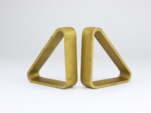 Par de sujetalibros triangulares dorados de hierro Carl Auböck III 5443, Viena/Austria, años 70